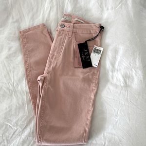 Light pink skinny jeans